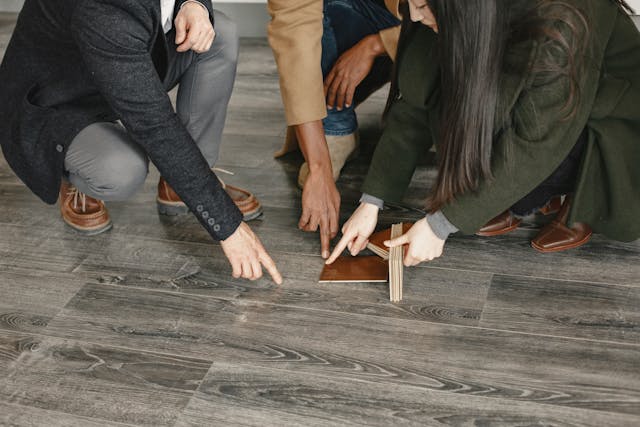 people-comparing-flooring-colours