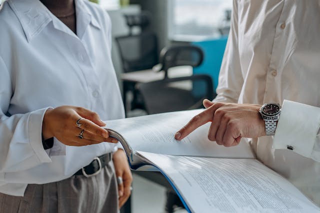 two-professionals-reviewing-a-document-together-in-an-office-setting