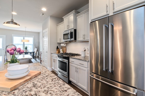 kitchen with white cabinets and stainless steel appliances