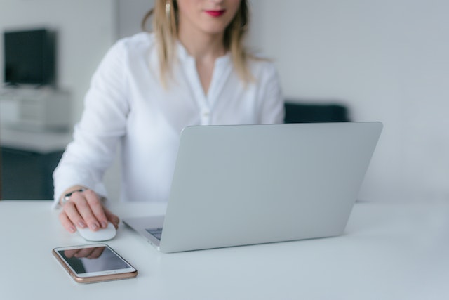 person-working-on-computer-at desk