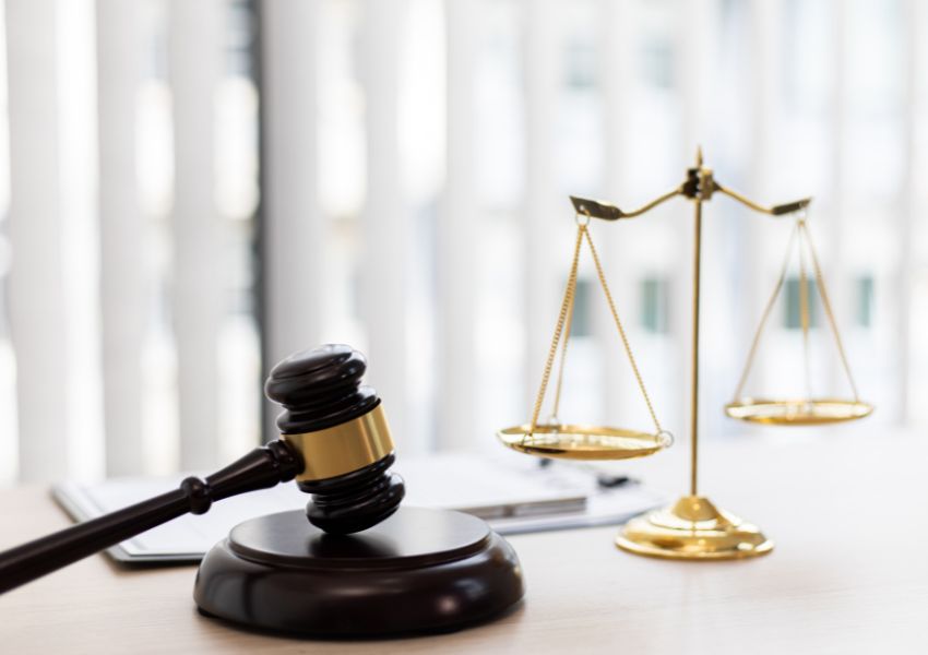 judges gavel and legal balance on a desk