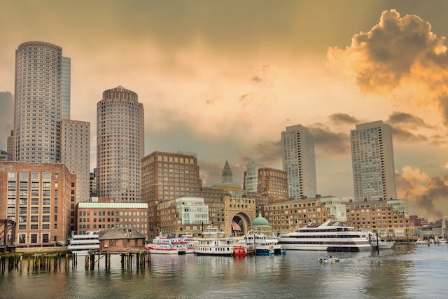 a view of the Boston harbour during sunset