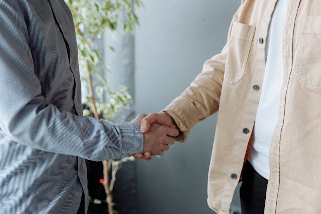 two-people-shaking-hands