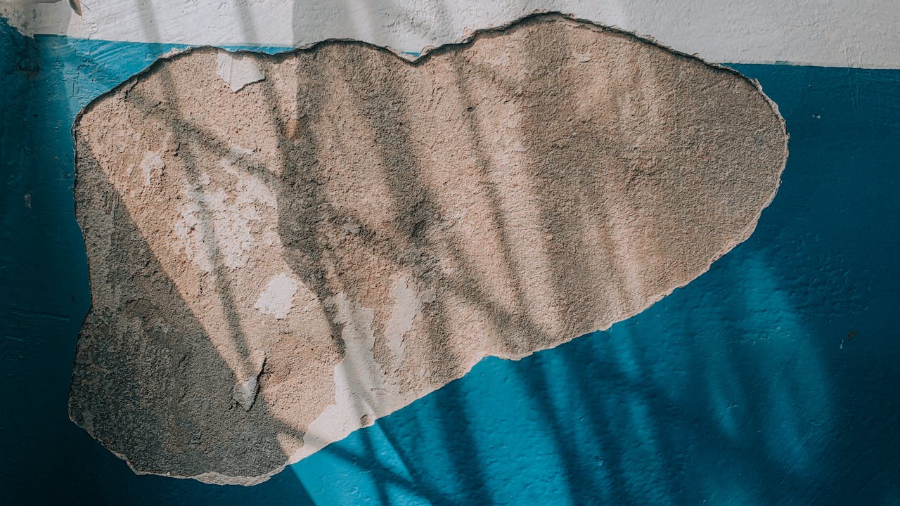 Exposed drywall gypsum.