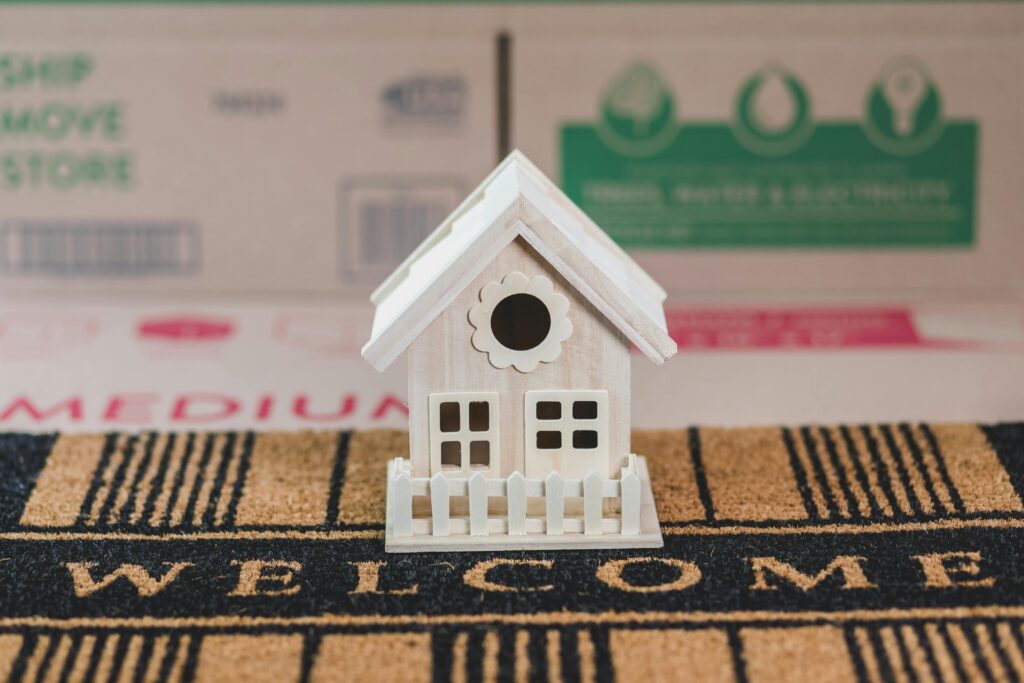 Model House on a Welcome Mat