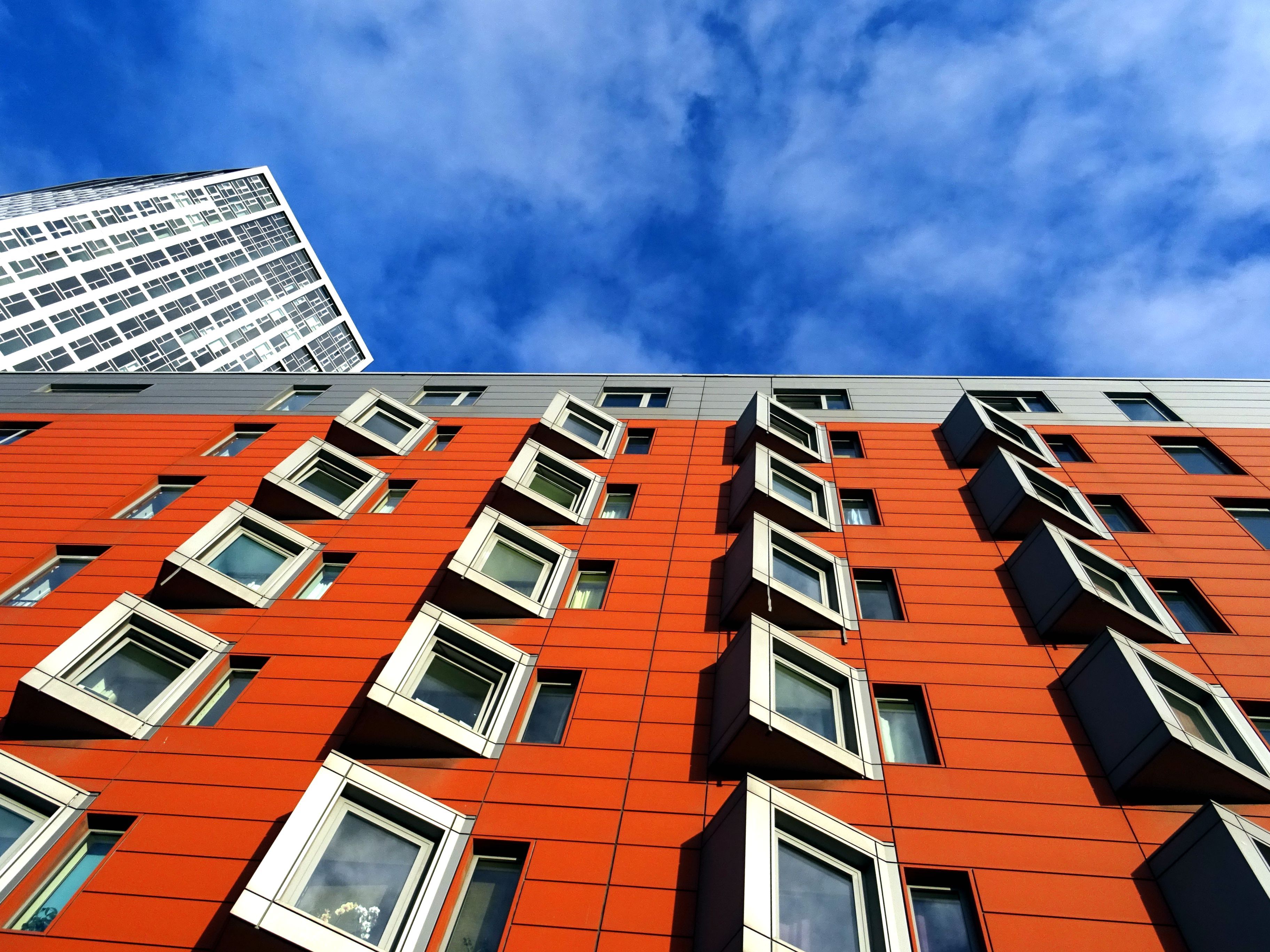 Orange facade of modern Boston Massachusetts apartments